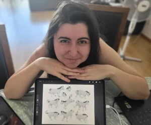 Noam Levi - Kidlit illustrator with her illustration tablet